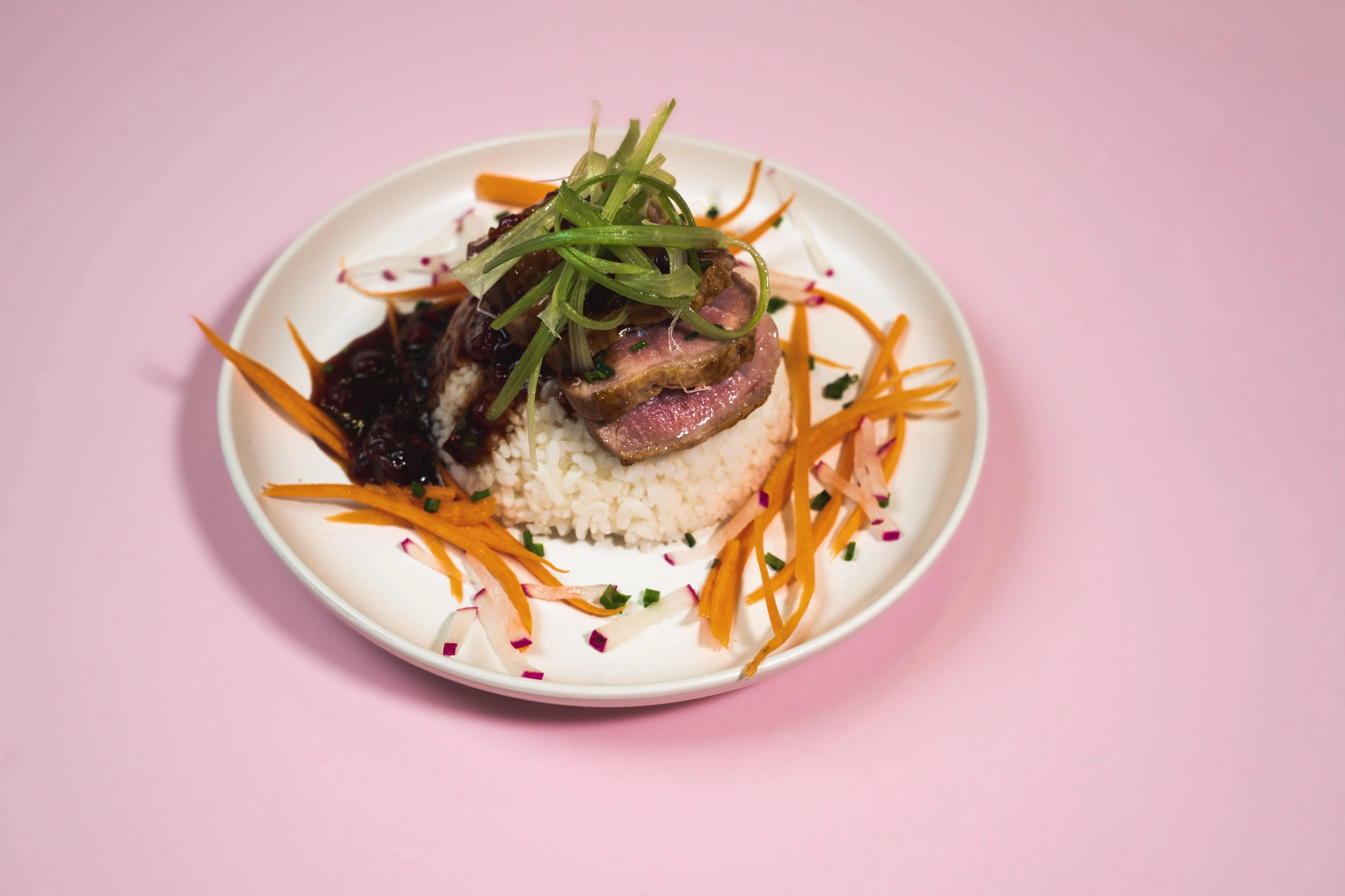 Sticky Rice with Pan-Fried Duck Breast, Hoisin & Mixed Berry Compote Recipe | Tilda Rice UK